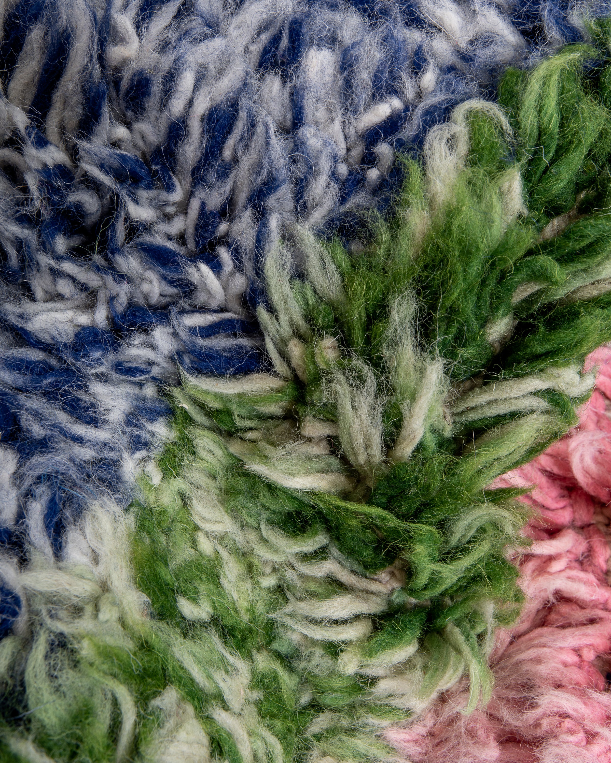 Modern, designer, handcrafted Berber rug from Morocco. Beniourain carpet with beautiful colors and patterns and fluffy wool texture.